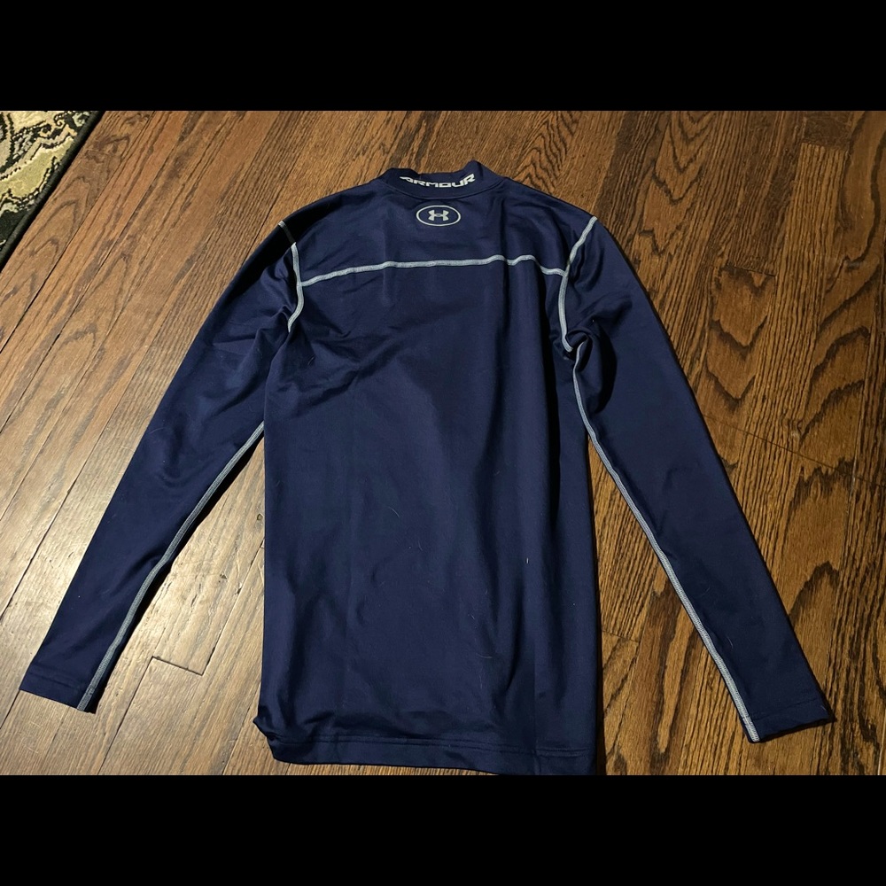 Women’s Under Armour size med navy blue compression shirt
